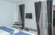 Kamar Tidur 6 Blue Orchid Family Cottage