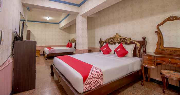 Kamar Tidur OYO 738 Maganda Hotel