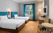 Bedroom 7 Luminor Hotel Palembang By WH