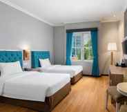 Bedroom 7 Luminor Hotel Palembang By WH
