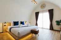 ห้องนอน Srida Resort Lanna & Cafe
