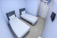 Kamar Tidur Lexus guest house Medan