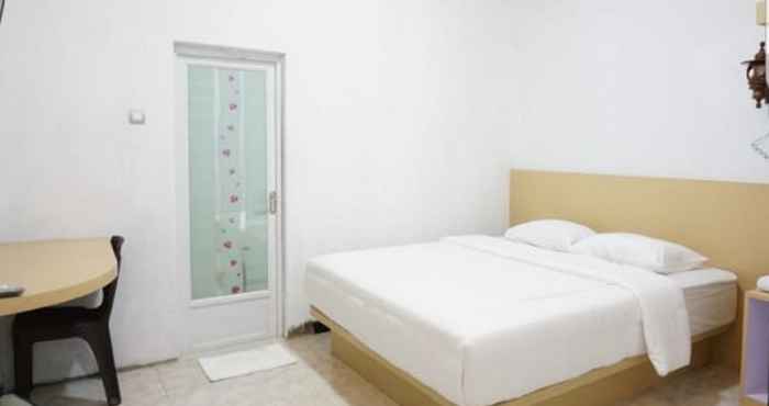 Bedroom OYO 90221 Makarim Guest House Syariah