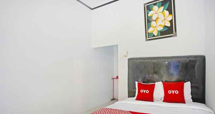 Bedroom OYO 90229 Fidel Caestro Homestay