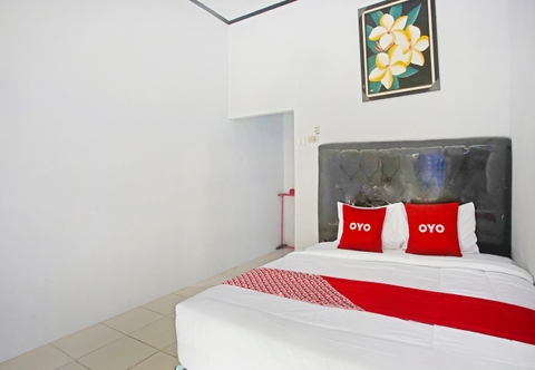 Kamar Tidur OYO 90229 Fidel Caestro Homestay