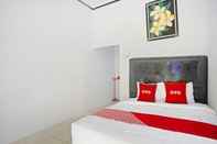 Bedroom OYO 90229 Fidel Caestro Homestay