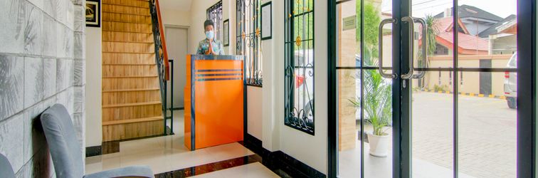 Lobi OYO 90233 The Shine Residence