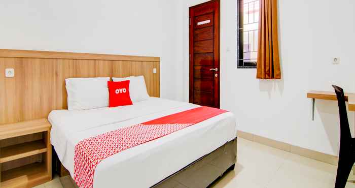 Kamar Tidur OYO 90233 The Shine Residence