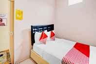 Kamar Tidur OYO 90234 Dhoho Family Guest House