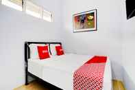 Bedroom OYO 90237 Ar 20 Guest House Syariah