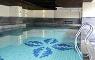 Swimming Pool 6 Best Location 2BR Apartment at Tamansari La Grande By Travelio