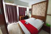 Bedroom Premi Inn Margonda Residence