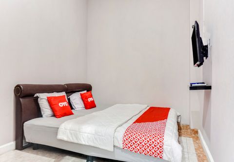 Bedroom OYO 90277 Kmk Residence