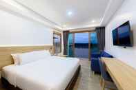 Phòng ngủ Chiangkhan River Walk Hotel