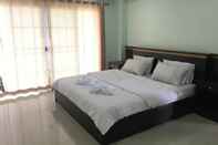 ห้องนอน DIN KHAO APARTMENT