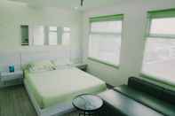 Kamar Tidur Lemongrass Room by Azzam