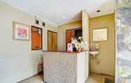 Lobby 5 OYO 90293 Guest House Cigadung 9a