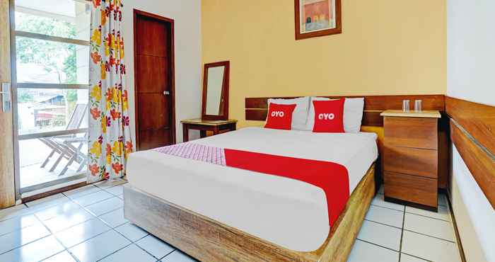 Phòng ngủ OYO 90293 Guest House Cigadung 9a