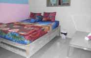 Kamar Tidur 5 Yunior Guesthouse