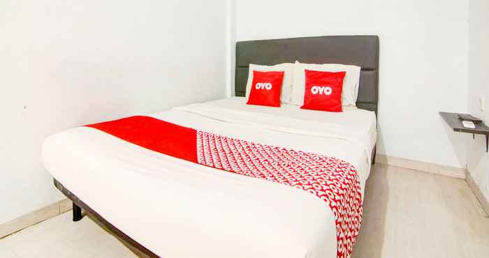 Kamar Tidur OYO 90310 Cosmo Harmoni