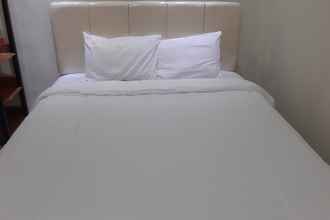 Kamar Tidur 4 OYO 90299 Corner Guest House