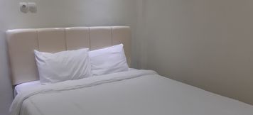 卧室 5 OYO 90299 Corner Guest House