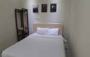 Kamar Tidur 3 OYO 90299 Corner Guest House