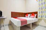 Kamar Tidur OYO 90322 Joy Homestay Near Bella Terra Lifestyle Center