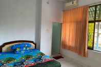 ห้องนอน Bulusaraung Homestay Makassar