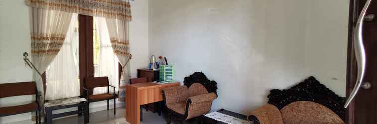 Lobi OYO 90334 Gloria Homestay