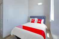 Kamar Tidur Capital O Olive Guest House Surabaya