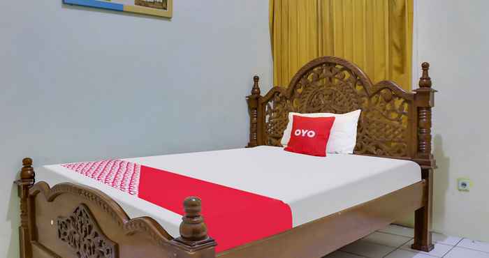 Phòng ngủ OYO 90316 Hotel Candri Pelaihari