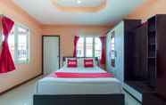 Kamar Tidur 7 OYO 1166 Train Way Resort