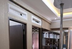 침실 7 The Suites Metro Apartment By Zaky