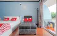 Bedroom 7 OYO 75308 Pea Najan Home Resort