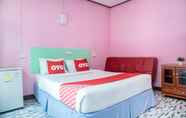 ห้องนอน 6 OYO 797 Pink House Bungalow