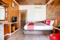 Kamar Tidur OYO 797 Pink House Bungalow