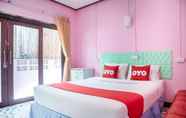 ห้องนอน 5 OYO 797 Pink House Bungalow