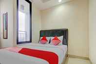 Phòng ngủ OYO 90339 Evenciio Apartment Syariah