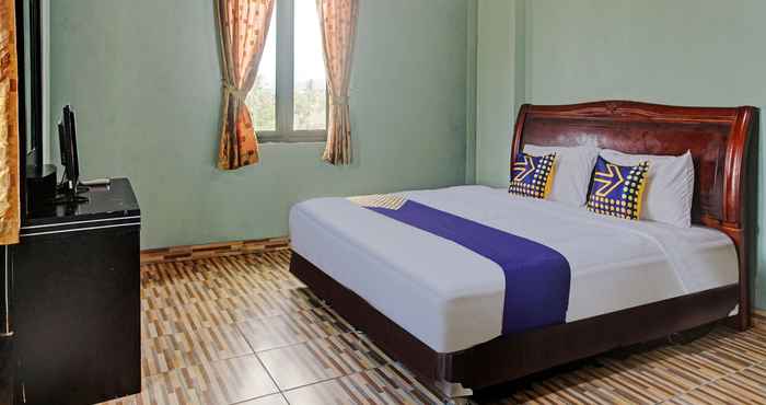 Kamar Tidur SPOT ON 90340 Al Bayt Homestay Syariah