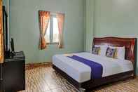 Kamar Tidur SPOT ON 90340 Al Bayt Homestay Syariah