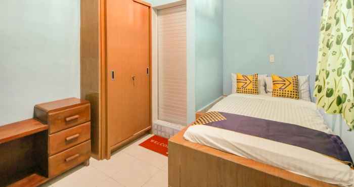 Kamar Tidur SPOT ON 90356 Gmmo Homestay