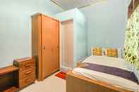 Kamar Tidur SPOT ON 90356 Gmmo Homestay