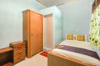 Bedroom SPOT ON 90356 Gmmo Homestay