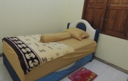 Kamar Tidur 4 Avicenna 3 Guesthouse