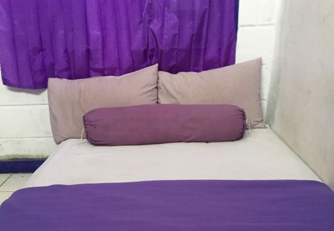 침실 Caraka Hotel Batununggal