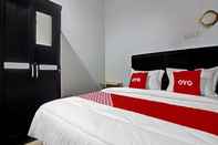 Kamar Tidur OYO 90353 Dewi Guesthouse