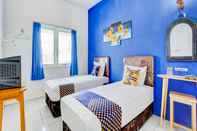 Bedroom SPOT ON 90349 Edotel Tebe Syariah