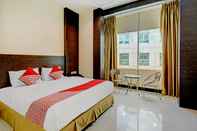 Kamar Tidur OYO 90350 Hotel Five Star 2