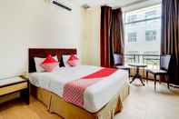 Kamar Tidur OYO 90351 Hotel Five Star 1